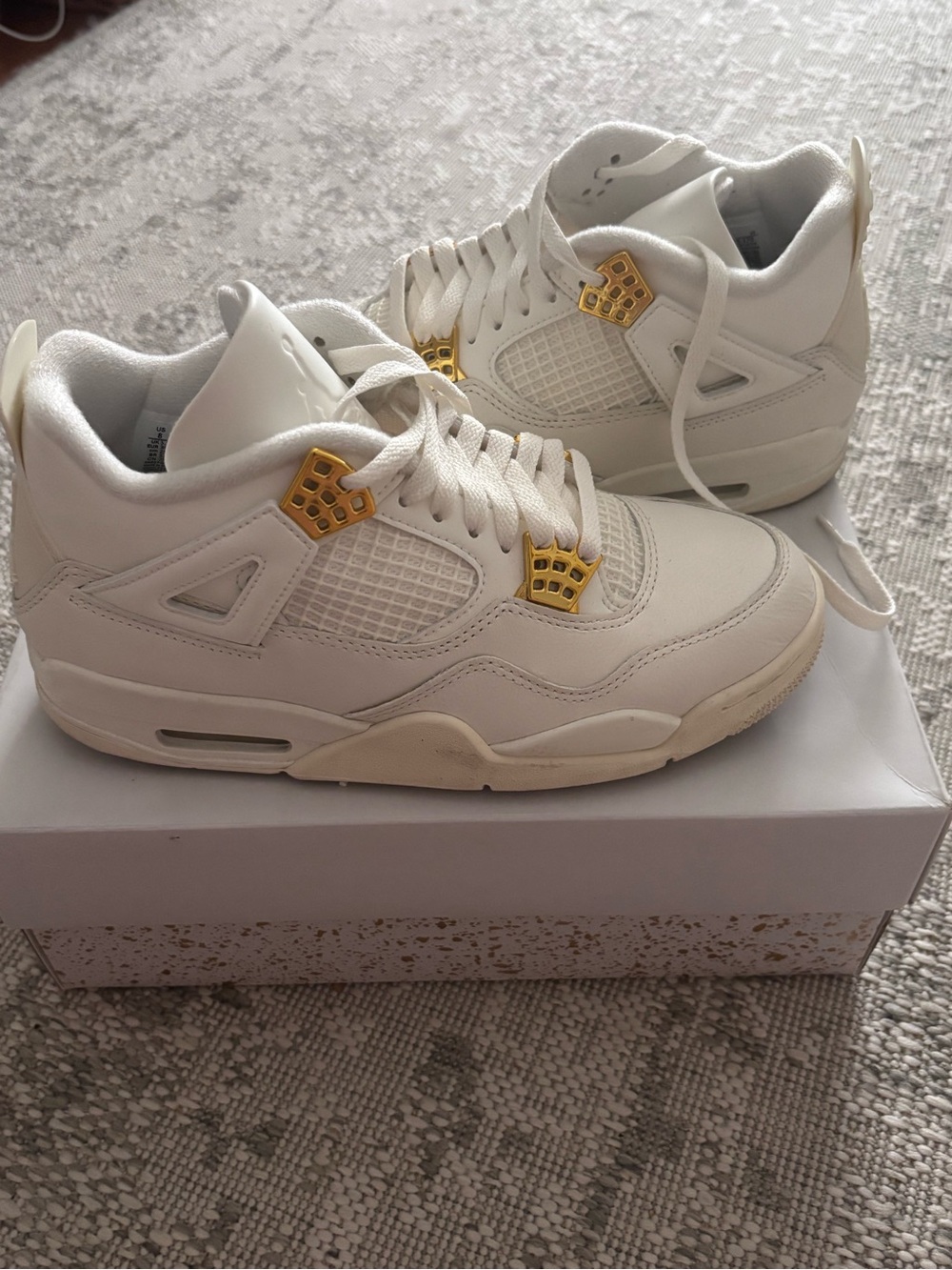 Women’s Air Jordan 4 Retro White Sneakers with Metallic Gold Accents